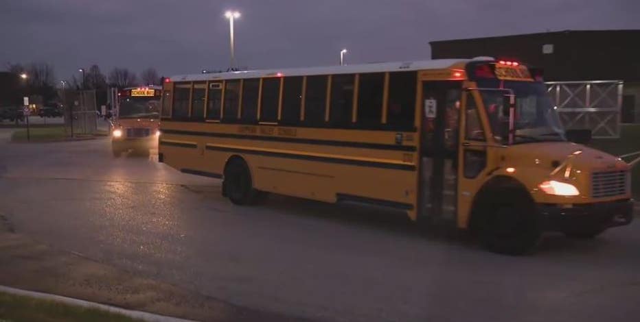 School buses from 13 different districts drive to Oxford HS to