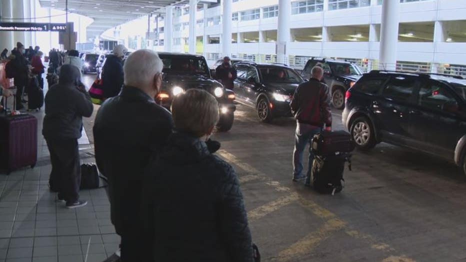 The hustle and bustle of the holiday travel season is happening outside Metro Airport this year, not as much inside.