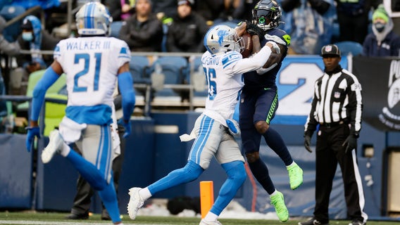 Penny, Metcalf lead Seahawks to 51-29 blowout of Lions