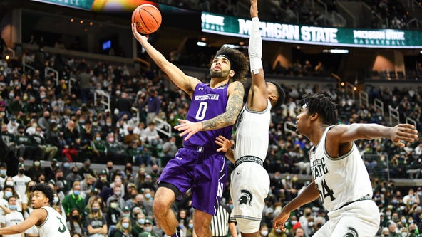 Young leads Northwestern past No. 10 Michigan State 64-62