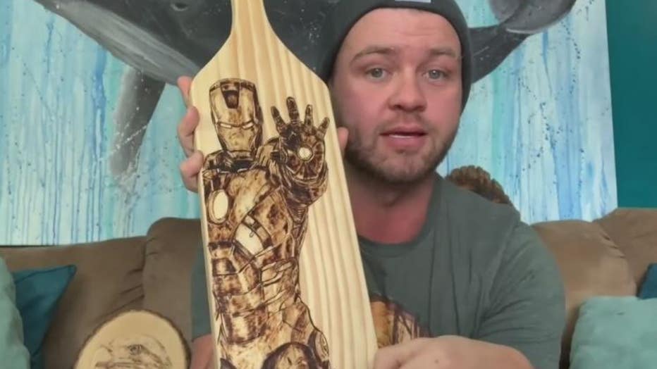 Austin Sabinski from White Lake has become a social media star with his art of burning wood.