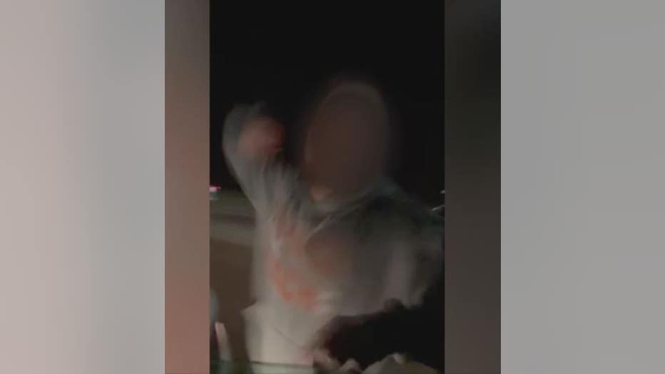 Still photo from video of the road rage altercation.