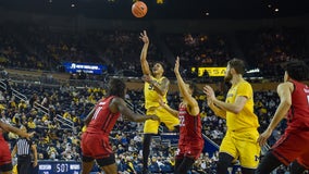 Michigan, without suspended Howard, beats Rutgers 71-62