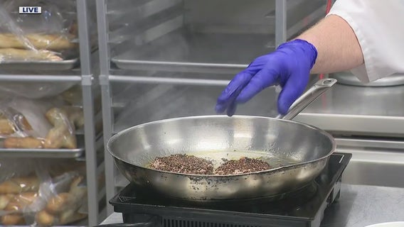 Preparing Steak au Poivre at Andiamo's new bistro the Statler