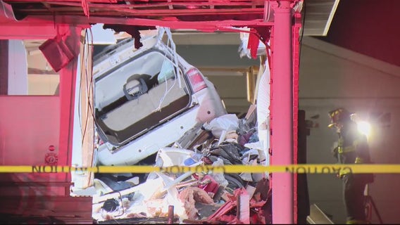 Car hits curb and barrels through Livonia home, missing sleeping man by a foot