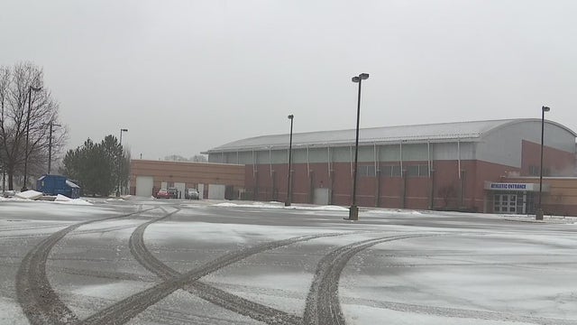 Left for dead: Woman run over in Detroit school parking lot