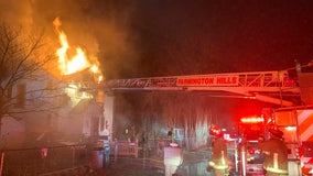 Firefighters save woman from second floor of burning Farmington Hills home