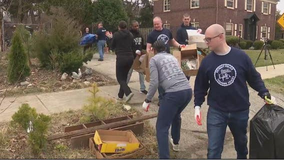 Detroit police, city workers help clear elderly resident's home blight