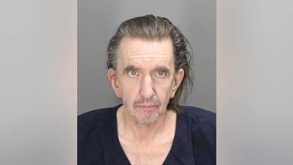 Man who lived with dead roommate a month charged; foul play ruled out