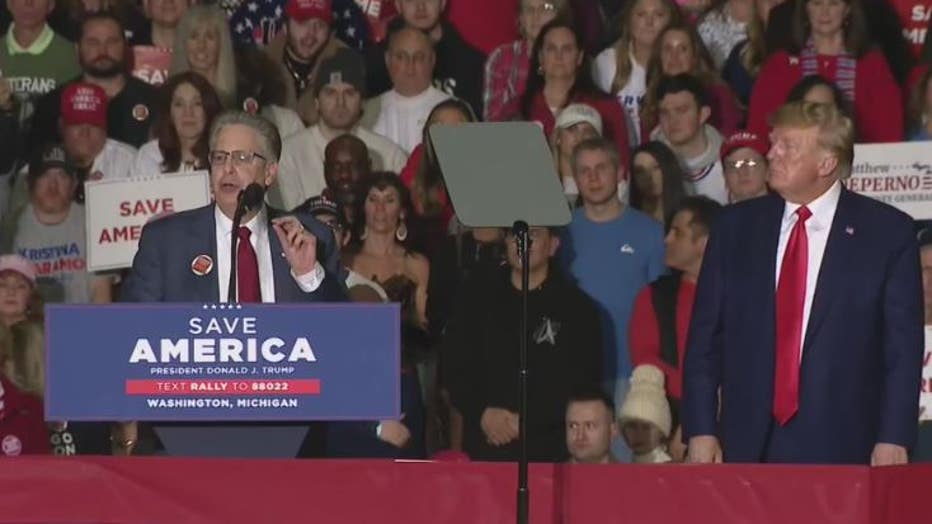 Republican challenger for state attorney general Matt DePerno with President Donald Trump at a Michigan rally.