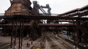Russian forces storm Mariupol steel plant as some evacuees reach safety