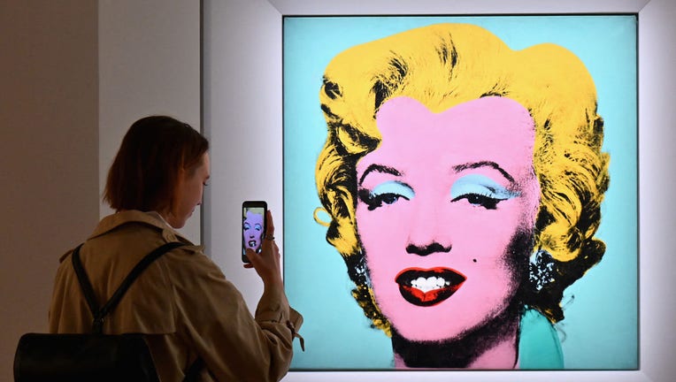 Andy Warhol's Marilyn Monroe portrait sells for record $195