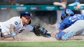 Grossman leads Tigers past Rangers 7-3 for series split