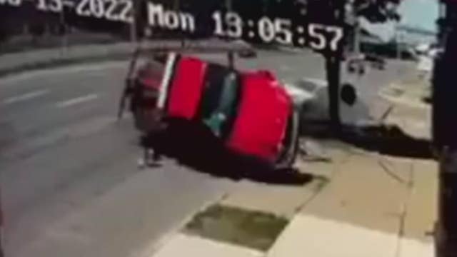 Head-on crash sends tow truck through storefront on Woodward