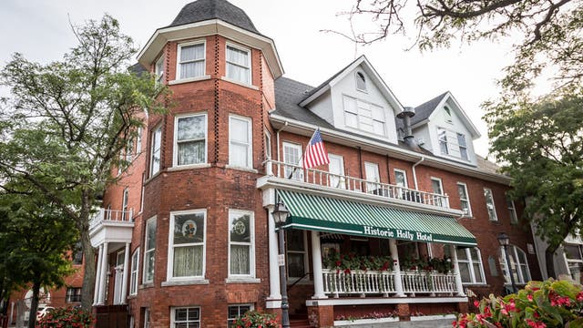 Historic Holly Hotel, known for its ghost stories, damaged in multi-building fire