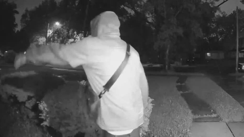 A Ring doorbell video of the armed suspect.