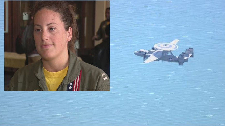 Chelsea MacGriff and the E-2 Hawkeye she flew today.