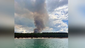 Crews battling wild fire at Pictured Rocks say blaze got within mile of national lakeshore