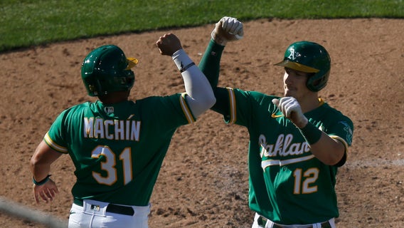 Murphy's 3-run homer helps A's split doubleheader with Tigers