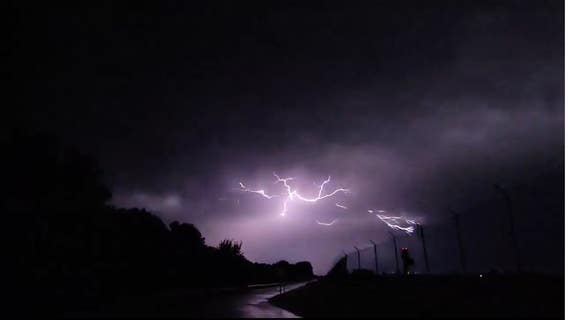 Lightning forks across west Michigan sky, slow-motion video captures