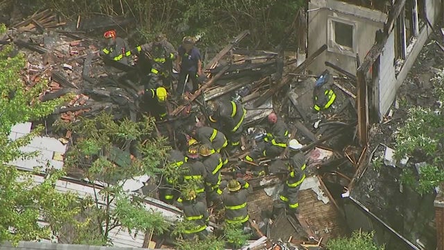 Video: Detroit firefighter rescued in collapse while battling fire at vacant home