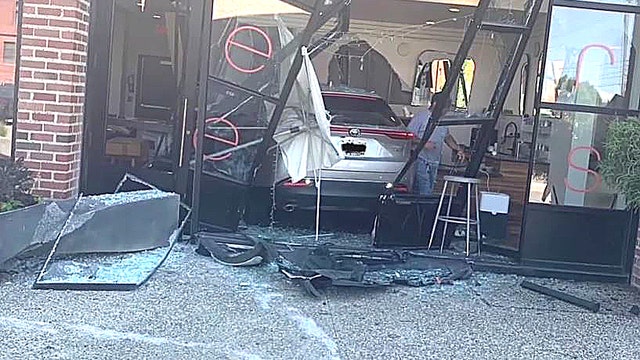 Driver crashes through Detroit coffee shop injuring worker