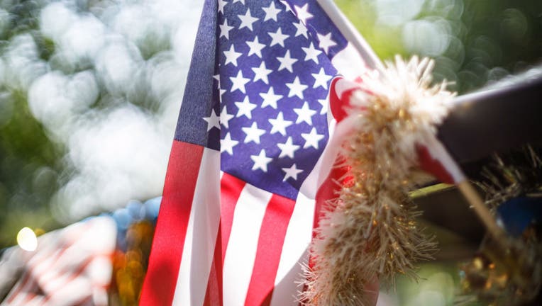 9aa37cfe-American flag seen on display during the Doo Dah party in