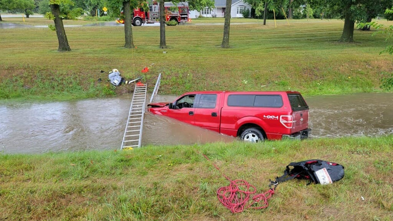 Armada firefighters make water rescue after truck drives into creek