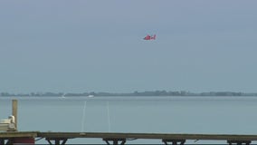 Dive teams looking for body of missing boater who went overboard on Lake St. Clair