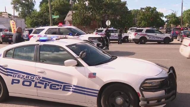 Detroit police officer shot at by carjacking suspects; 2 in custody 1 at large