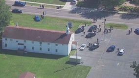 Armed robbery suspect taken into custody by police at Westland church