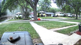 Video shows Livonia high schoolers drive past house fire, stop to save people inside