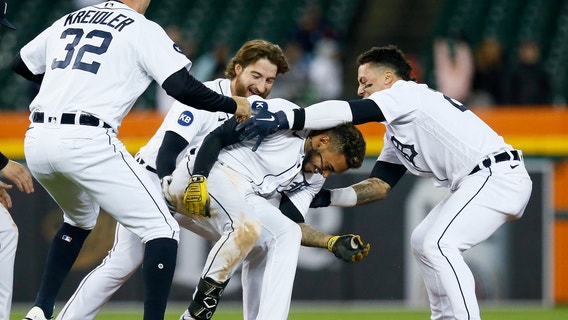 Castro has 2 late singles, Tigers beat Royals 4-3 in 10