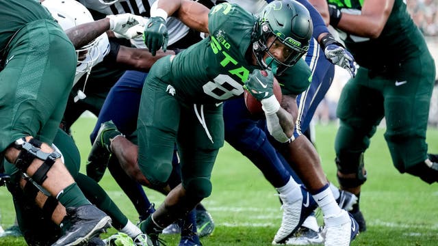No. 14 Michigan State runs for 6 TDs in 52-0 rout of Akron