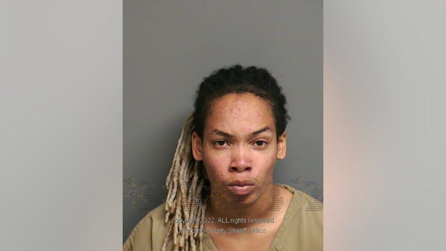 Woman charged after man riding bike to work attacked with machete