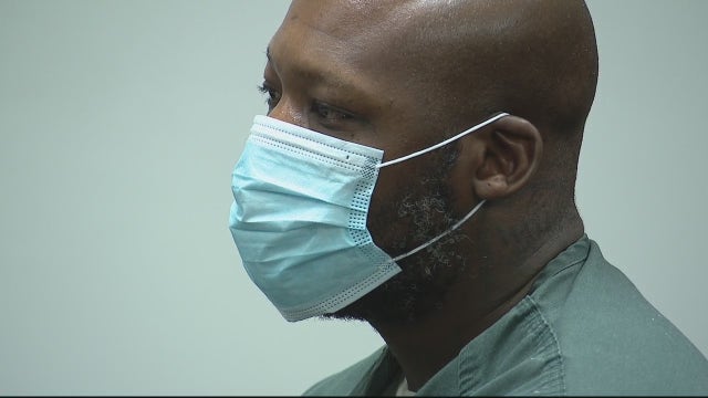 Aaron Salter, wrongly convicted of murder, charged with choking woman and holding her against her will