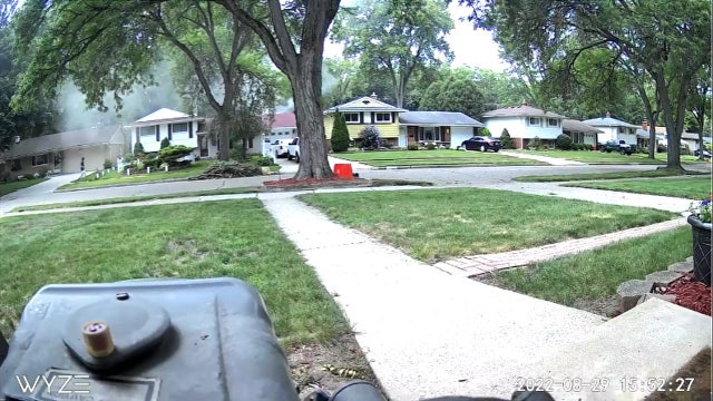 Video shows Livonia high schoolers drive past house fire, stop to save people inside