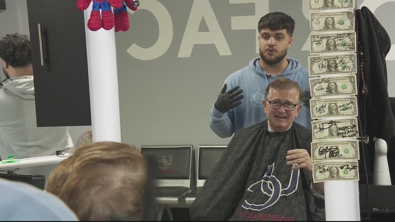 Barber Rich' delivers haircuts, life lessons during Titan Men of
