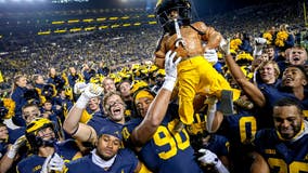 No. 4 Michigan tops Michigan St 29-7 and stews about scuffle