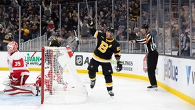 Marchand has 2 goals and an assist in return, Bruins roll