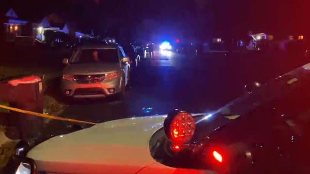 VIDEO: dozens of shots fired at Detroit Police officer as suspects hide behind SUV