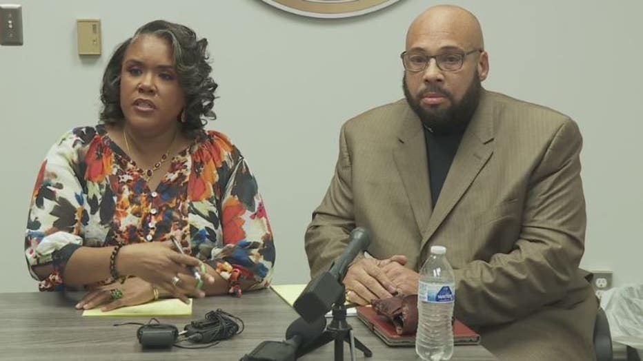 Attorney Dionne Webster Cox, left, and David Hurley.