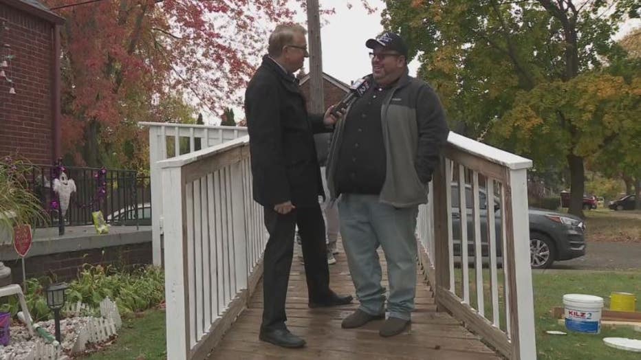 Good Samaritan Gaston Munoz talks with Charlie Langton.