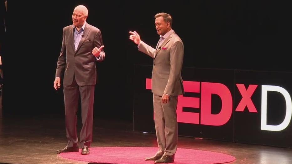 Retired FOX 2 anchor Huel Perkins and current FOX 2 anchor Roop Raj at TEDx Detroit.