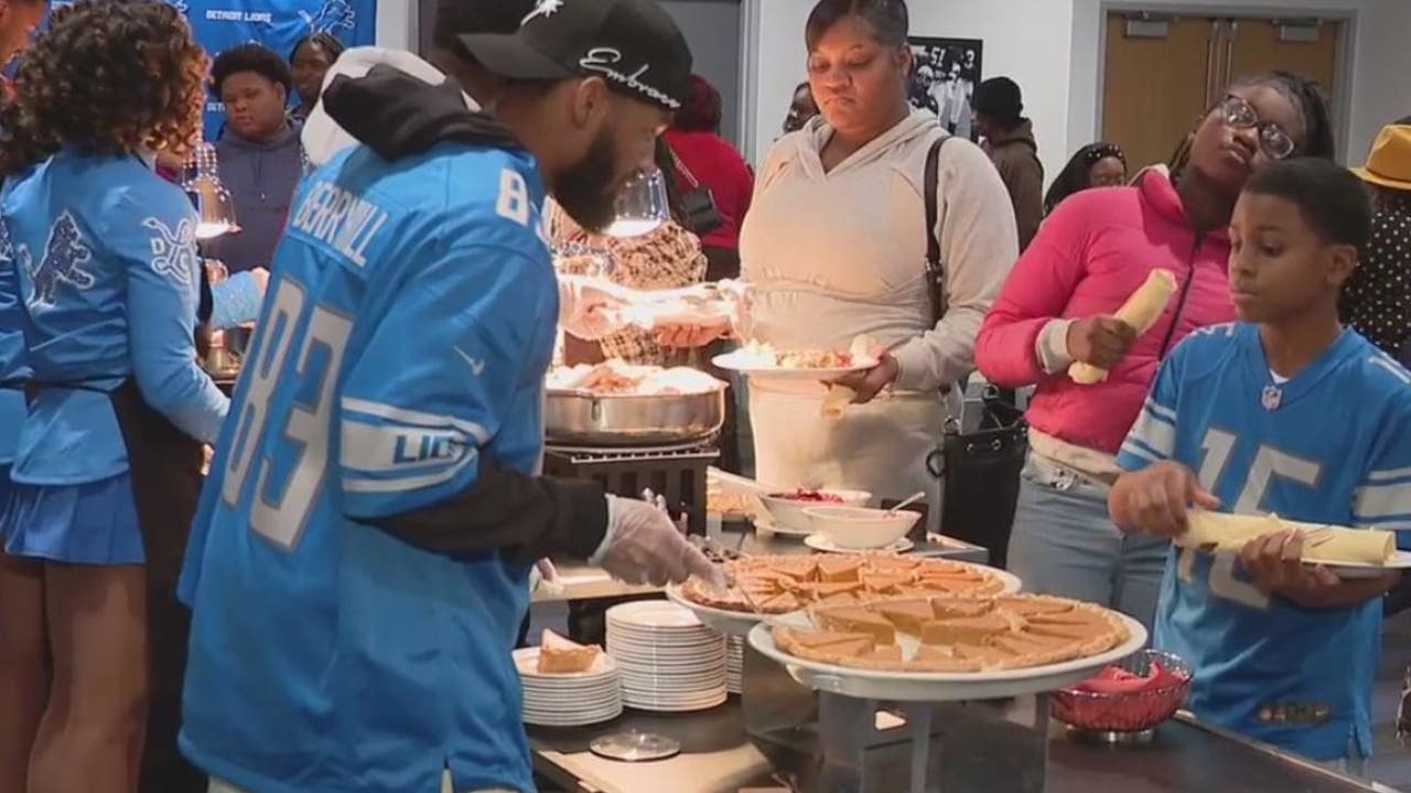 Detroit Lions, Pure Heart serve Thanksgiving dinner to children of