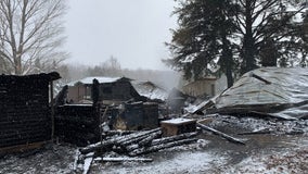 1 person, dog killed in house fire at northern Michigan trout farm