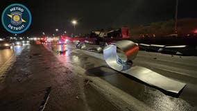 Semi carrying steel coils crashes into median on I-696, blocking traffic in Southfield