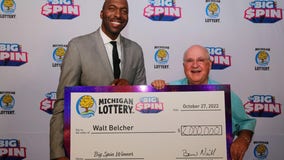 WATCH: Waterford man wins $2 million from Michigan Lottery's The Big Spin with John Salley