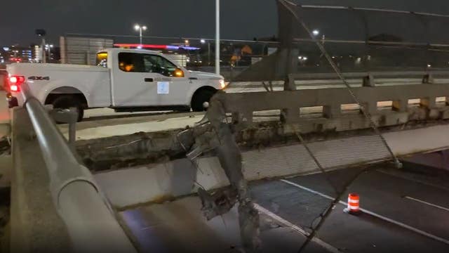 SUV crashes through Brush Street barrier, falls onto I-75