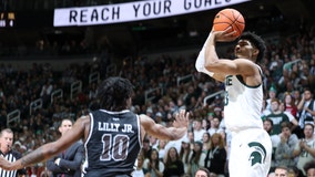 Hauser scores 22 points in Michigan State's easy victory